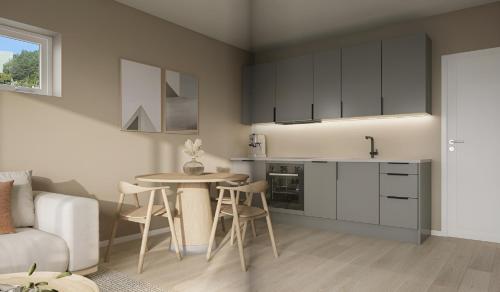 Køkken eller tekøkken på Modern apartment by the sea