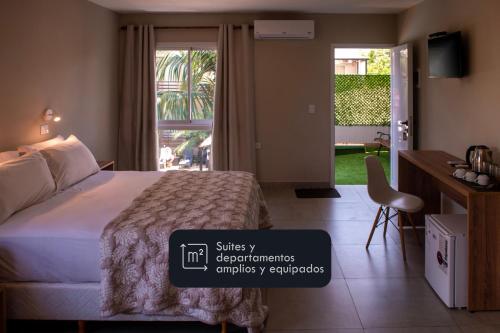 Giường trong phòng chung tại INGA by DOT Suites