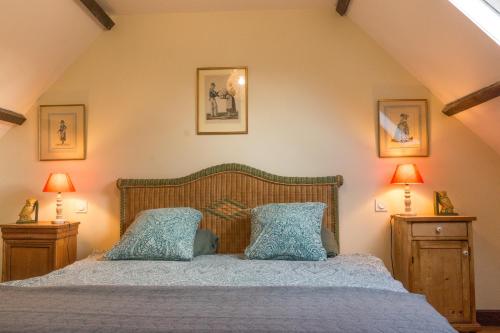 En eller flere senge i et værelse på Carnac: Maison chaleureuse, calme proche plages