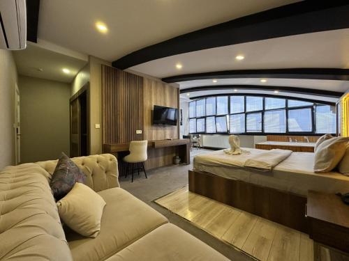 Ένα ή περισσότερα κρεβάτια σε δωμάτιο στο Anatolia Luxury Hotel