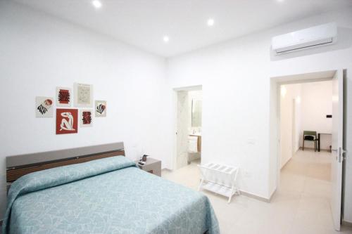 Postel nebo postele na pokoji v ubytování A Casa di Gianni