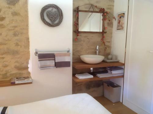 Кровать или кровати в номере Le Moulin Bas Chambre d'Hote