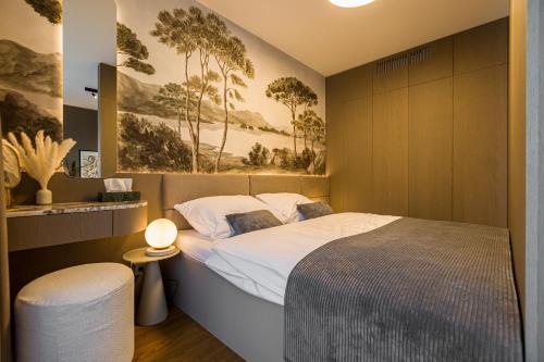 En eller flere senge i et værelse på Bohéme apartmán v srdci Bratislavy