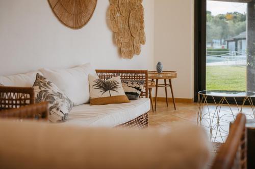 En eller flere senge i et værelse på La Smeraldina Resort