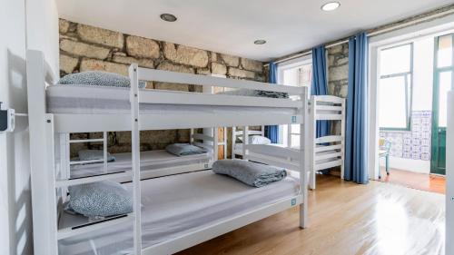 Ένα ή περισσότερα κρεβάτια σε δωμάτιο στο Invictus Hostel