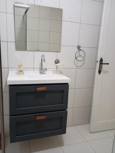 Et badeværelse på Casa agradável no Rio de Janeiro - Ilha do Governador