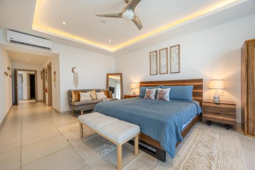 Ένα ή περισσότερα κρεβάτια σε δωμάτιο στο La Vista 2 - Diriá Tamarindo