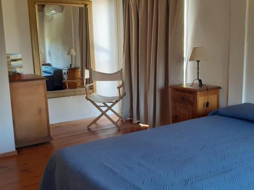 Ένα ή περισσότερα κρεβάτια σε δωμάτιο στο Dpto Vista Alago