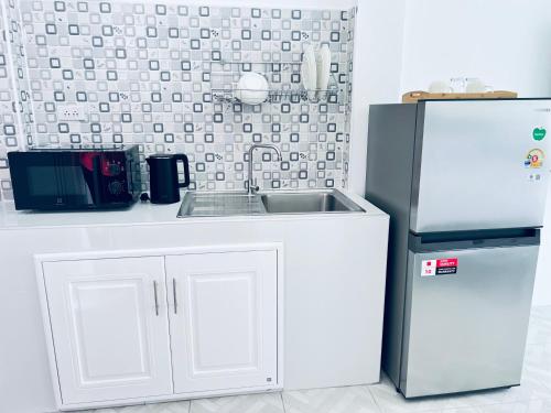 Nhà bếp/bếp nhỏ tại Sarona House 3