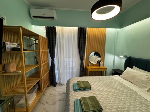 Ένα ή περισσότερα κρεβάτια σε δωμάτιο στο Luxury Living Patras