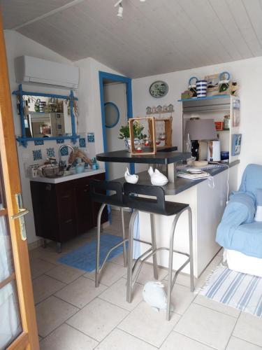 Kuchyň nebo kuchyňský kout v ubytování Le paradis