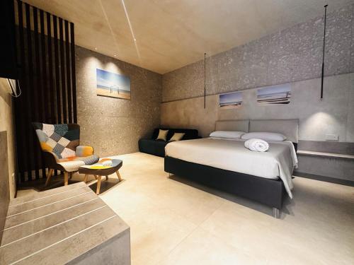 Ένα ή περισσότερα κρεβάτια σε δωμάτιο στο Zen escape Sicilia