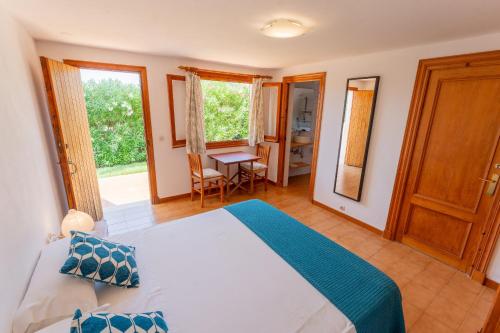 En eller flere senge i et værelse på Villa GALERA