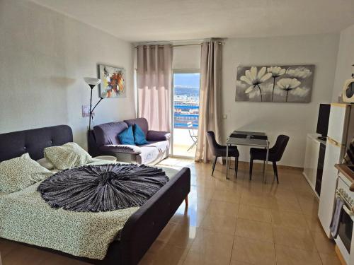 Posezení v ubytování Cozy studio with views in Playa Paraíso