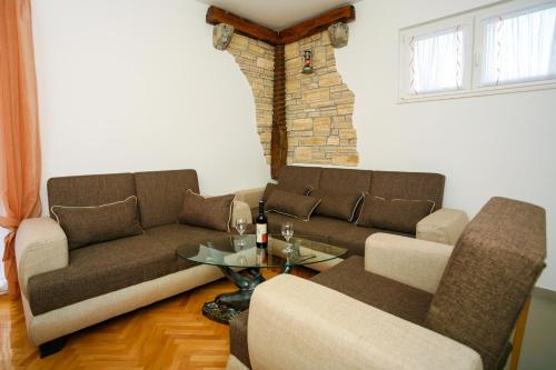 Ruang duduk di Apartments Intrada