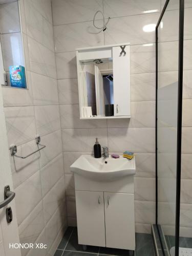 Phòng tắm tại Apartman Dunja