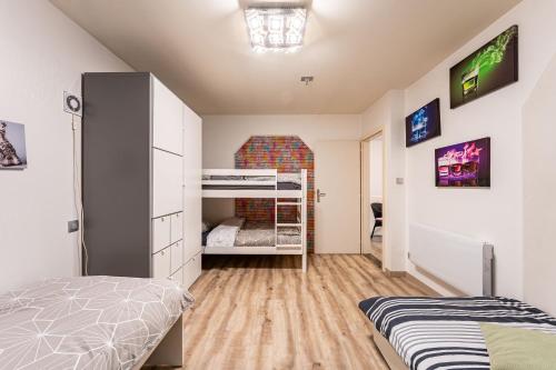 Postel nebo postele na pokoji v ubytování Ferme Équestre - Vue Unique sur les Chevaux