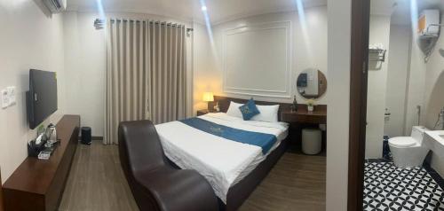 Ένα ή περισσότερα κρεβάτια σε δωμάτιο στο Thế Tùng HoTel