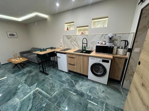 Η κουζίνα ή μικρή κουζίνα στο Cocoon Hyper Center