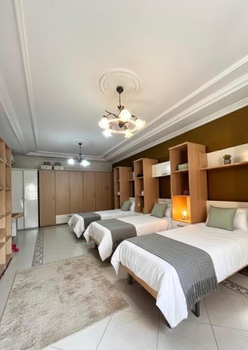 Ένα ή περισσότερα κρεβάτια σε δωμάτιο στο villa serenity Families Tanger