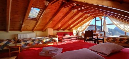 En eller flere senge i et værelse på Ξενώνας ΔΡΟΣΟΣΤΑΛΙΑ Some of Attic