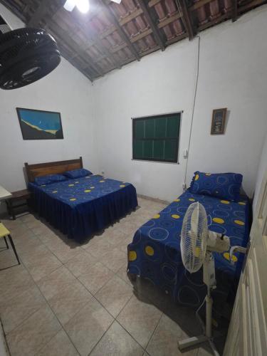 Ένα ή περισσότερα κρεβάτια σε δωμάτιο στο rancho da bohemia