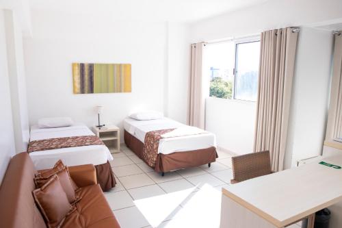 Ένα ή περισσότερα κρεβάτια σε δωμάτιο στο Apartamento Le Jardin