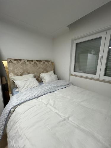 Ένα ή περισσότερα κρεβάτια σε δωμάτιο στο genesys