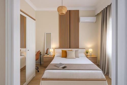 a bedroom with a large bed in a room at Mi Casa Chios in Chios