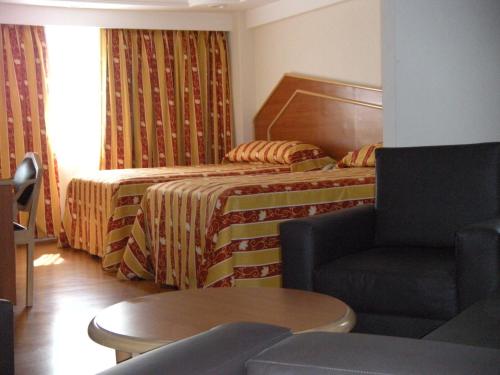 Krevet ili kreveti u jedinici u okviru objekta Hotel Premier