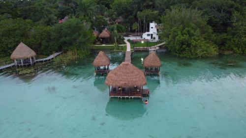 an aerial view of a resort in the water at Hotel Isabella Bacalar Lake Front in Bacalar