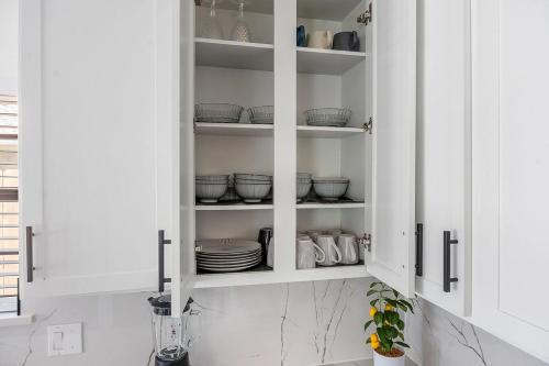 Køkken eller tekøkken på Plano Comfort with 4 Bedrooms