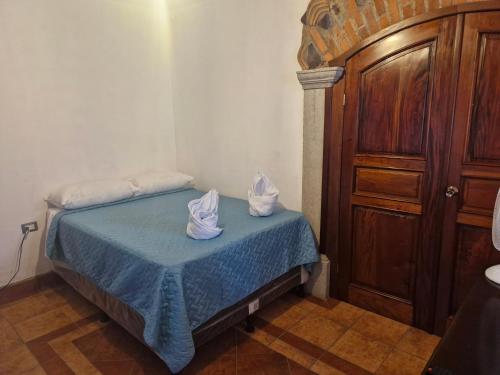 Ένα ή περισσότερα κρεβάτια σε δωμάτιο στο Beautiful Casita Chicauh