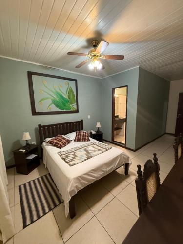 Ένα ή περισσότερα κρεβάτια σε δωμάτιο στο Pousada Manga Rosa