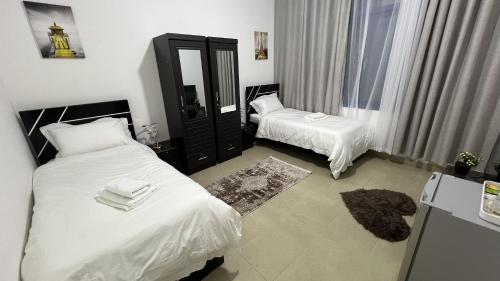 Postel nebo postele na pokoji v ubytování XD Cozy Apartments