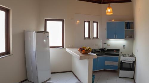 Køkken eller tekøkken på Refúgio Amarelo na Praia da Espera