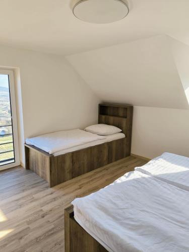 Ένα ή περισσότερα κρεβάτια σε δωμάτιο στο Milíkov 41