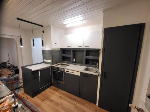 Η κουζίνα ή μικρή κουζίνα στο Stilvoll renoviertes Apartment in Grünlage