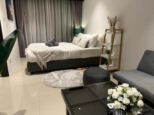 Ένα ή περισσότερα κρεβάτια σε δωμάτιο στο Utopia Central