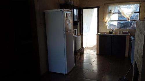 Η κουζίνα ή μικρή κουζίνα στο Mar apartamento