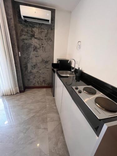 A kitchen or kitchenette at Edificio Suites los Laureles
