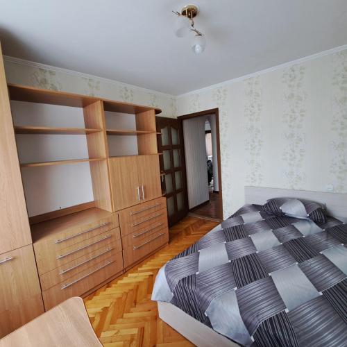 Llit o llits en una habitació de Центр