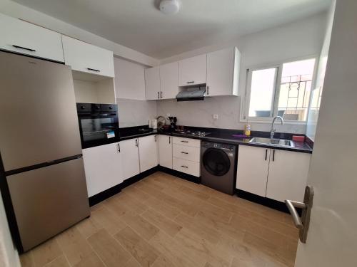 Una cocina o cocineta en T3 Moderne proche Ocean