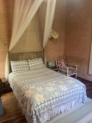 En eller flere senge i et værelse på Casa maravilhosa Olinda