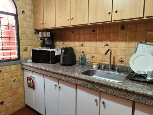 Η κουζίνα ή μικρή κουζίνα στο Casa Lili - Hospedaje en Cali