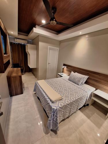 Ένα ή περισσότερα κρεβάτια σε δωμάτιο στο Hotel Brasil