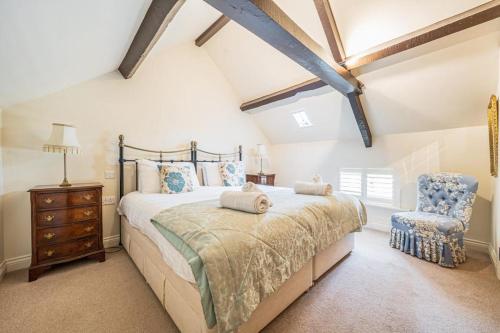 Ένα ή περισσότερα κρεβάτια σε δωμάτιο στο Lowther Cottage - Lake District Cottage with Log Burner