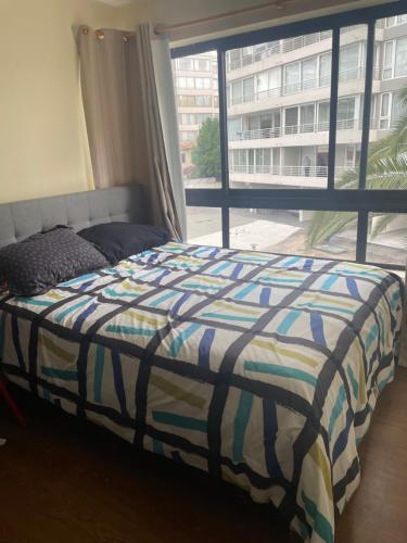 Postel nebo postele na pokoji v ubytování Departamento viña del mar para 5 huéspedes