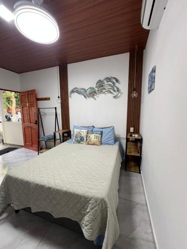 Llit o llits en una habitació de Sunzal Tropical 9