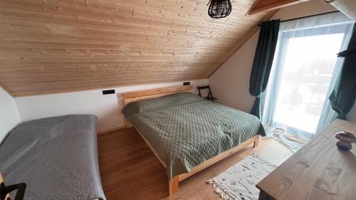 Ένα ή περισσότερα κρεβάτια σε δωμάτιο στο Bobrštajn